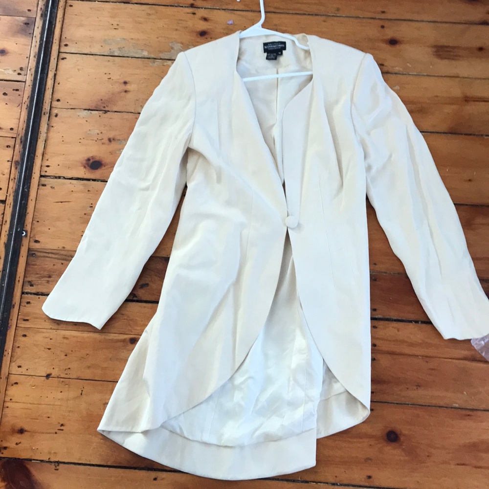 Ivory silk light weight jacket.